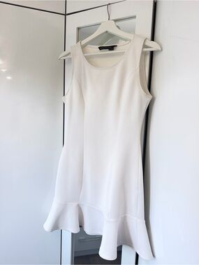 White Sleeveless Flounce Hem Dress